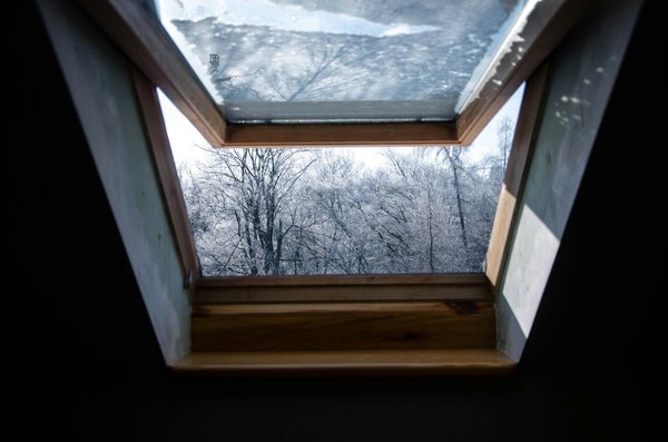 What are the best practices for installing a skylight in a UK attic?